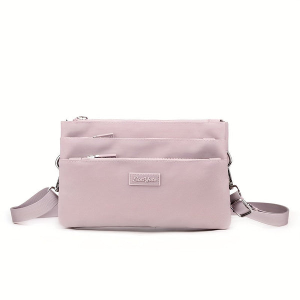 CompactCharm - Kompakte Multi-Layer Crossbody-Tasche