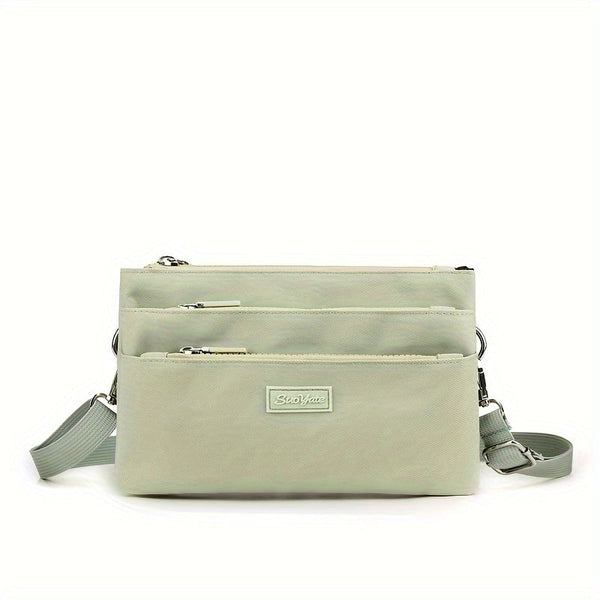 CompactCharm - Kompakte Multi-Layer Crossbody-Tasche